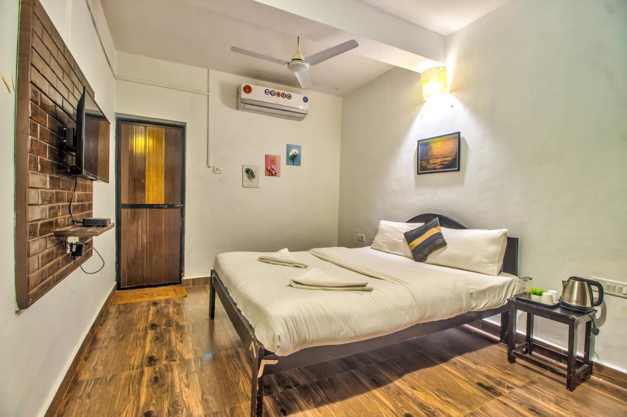 Stanleys Guest House Baga Esterno foto