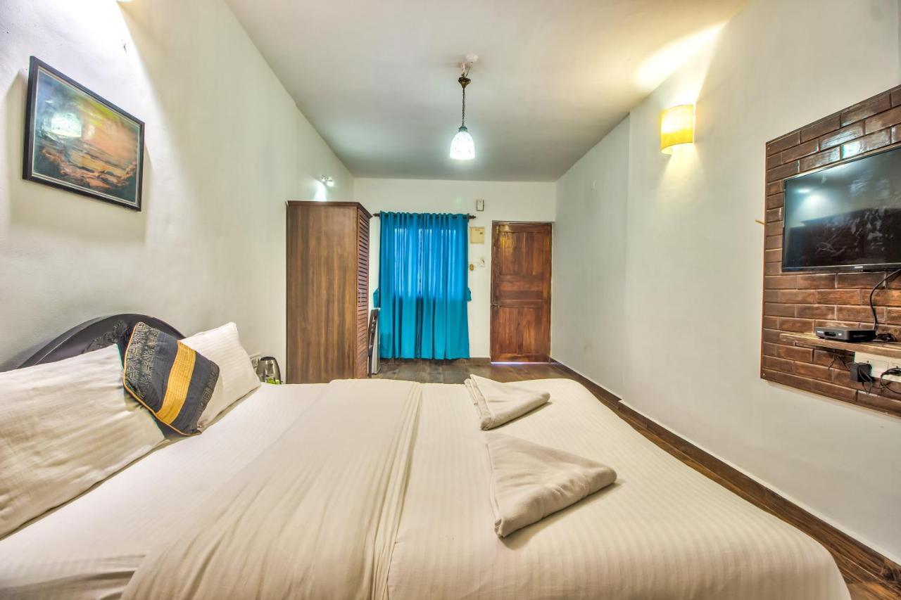 Stanleys Guest House Baga Esterno foto