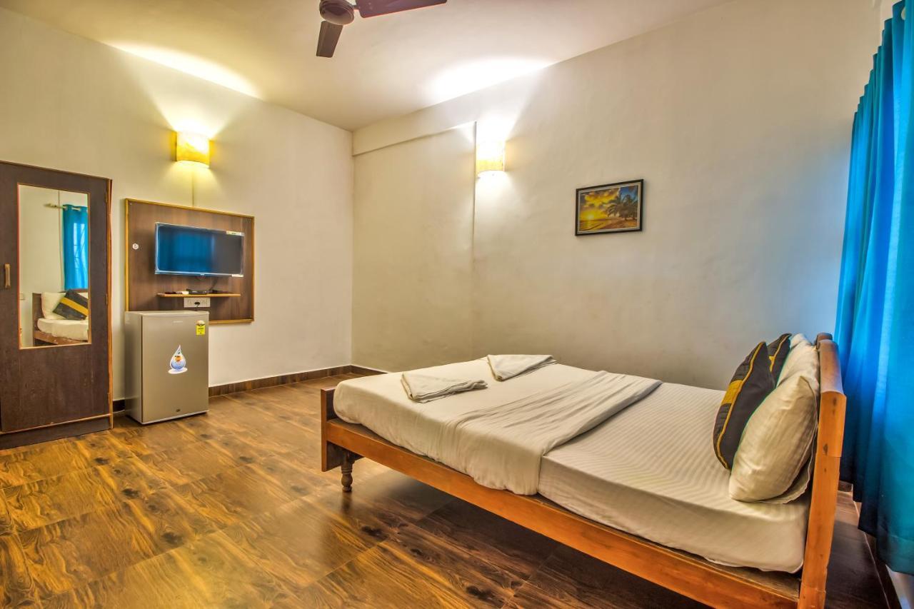Stanleys Guest House Baga Esterno foto