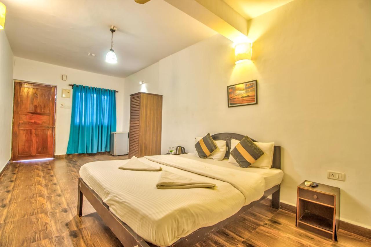 Stanleys Guest House Baga Esterno foto