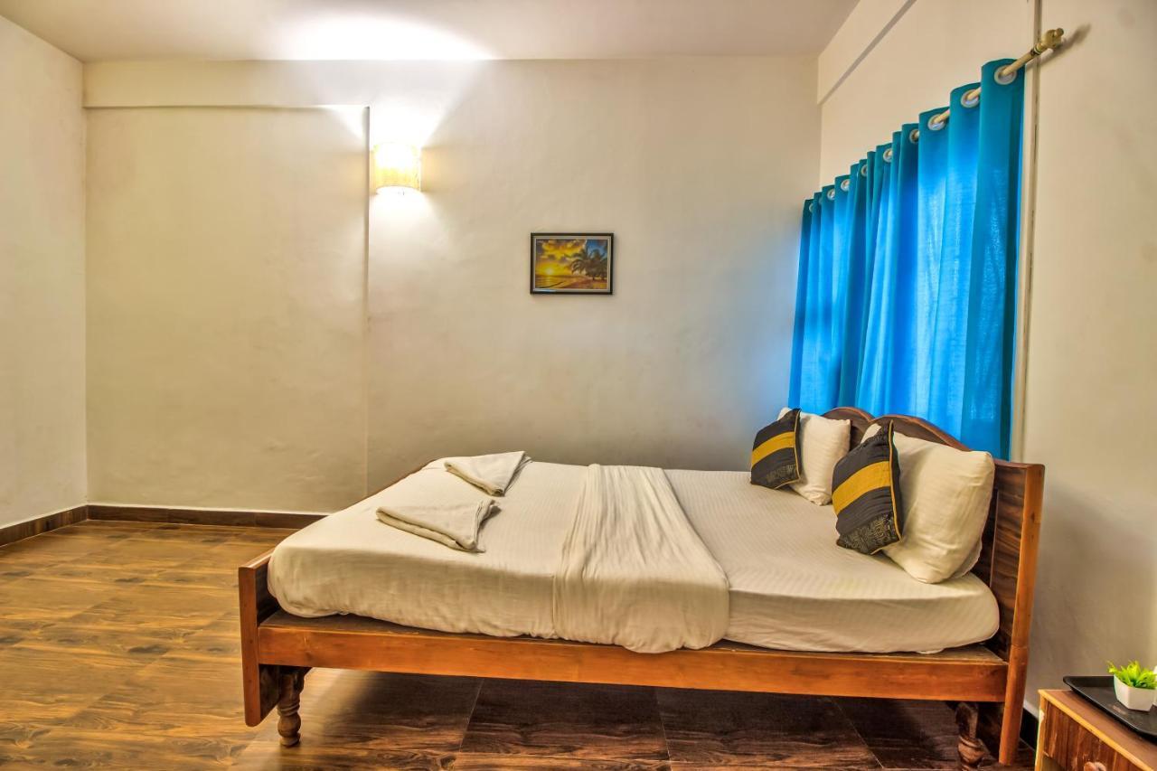 Stanleys Guest House Baga Esterno foto