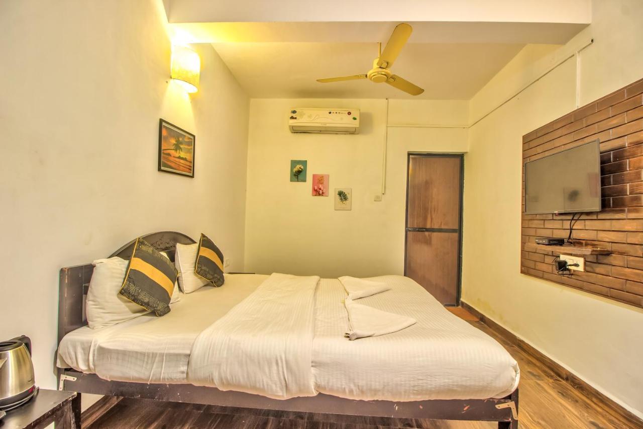 Stanleys Guest House Baga Esterno foto